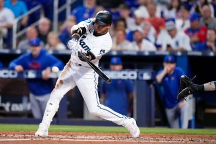 Apr 30, 2023; Miami, Florida, USA; Miami Marlins second baseman Luis Arraez (3) hits a single against the Chicago Cubs during the fourth inning at loanDepot Park. Mandatory Credit: Rich Storry-USA TODAY Sports