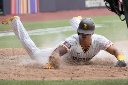 Apr 30, 2023; Mexico City, Mexico; San Diego Padres left fielder Juan Soto (22) slides into home plate to score in the eighth inning after the game during a MLB World Tour game at Estadio Alfredo Harp Helu. Mandatory Credit: Kirby Lee-USA TODAY Sports