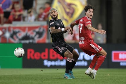 Aug 27, 2022; Harrison, New Jersey, USA; Inter Miami defender DeAndre Yedlin (2) battles for the ball against New York Red Bulls midfielder Caden Clark (37) at Red Bull Arena. Mandatory Credit: Vincent Carchietta-USA TODAY Sports