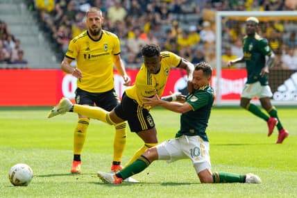 Sep 18, 2022; Columbus, Ohio, USA; Columbus Crew midfielder Luis Diaz (12) fights for a ball with Portland Timbers midfielder Sebastian Blanco (10) during the second half of the MLS game at Lower.com Field. The Crew and Timbers tied 1-1. Mandatory Credit: Adam Cairns-The Columbus Dispatch

Mls Portland Timbers At Columbus Crew