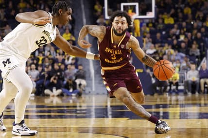 Dec 29, 2022; Ann Arbor, Michigan, USA;  Central Michigan Chippewas guard Jesse Zarzuela (3) dribbles on Michigan Wolverines forward Tarris Reed Jr. (32) in the second half at Crisler Center. Mandatory Credit: Rick Osentoski-USA TODAY Sports