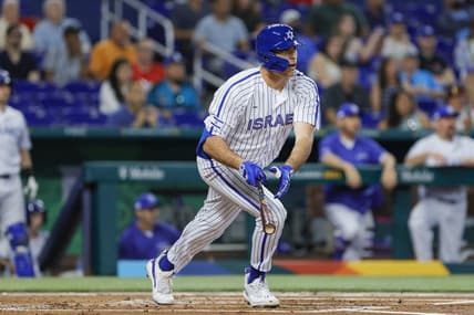 Mar 12, 2023; Miami, Florida, USA; Israel first baseman Matt Mervis (27) hits a single during the first inning against Nicaragua at LoanDepot Park. Mandatory Credit: Sam Navarro-USA TODAY Sports