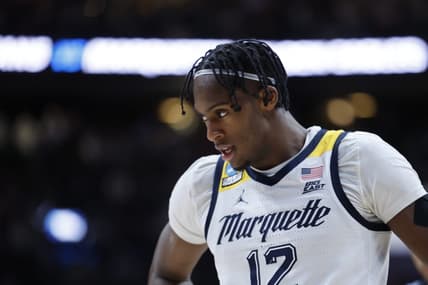 Mar 19, 2023; Columbus, OH, USA; Marquette Golden Eagles forward Olivier-Maxence Prosper (12) walks off the court after being defeated by the Michigan State Spartans at Nationwide Arena. Mandatory Credit: Rick Osentoski-USA TODAY Sports