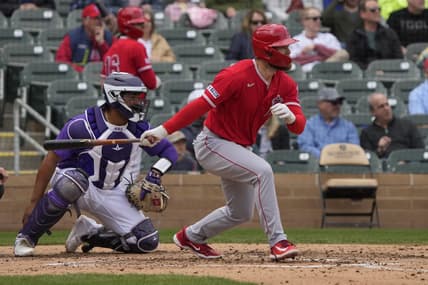 Mar 22, 2023; Salt River Pima-Maricopa, Arizona, USA; Los Angeles Angels first baseman Jared Walsh (20) hits an RBI double against the Colorado Rockies in the fourth inning at Salt River Fields at Talking Stick. Mandatory Credit: Rick Scuteri-USA TODAY Sports