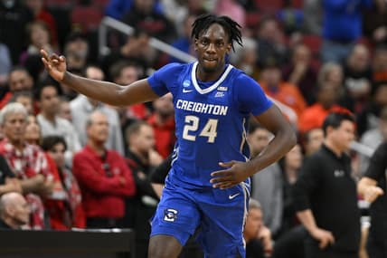 Mar 26, 2023; Louisville, KY, USA;  Creighton Bluejays forward Arthur Kaluma (24) celebrates scoring a basket during the second half against the San Diego State Aztecs at the NCAA Tournament South Regional-Creighton vs San Diego State at KFC YUM! Center.  Mandatory Credit: Jamie Rhodes-USA TODAY Sports
