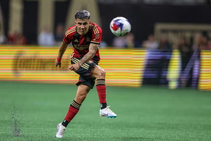 Apr 1, 2023; Atlanta, Georgia, USA; Atlanta United midfielder Thiago Almada (23) takes a free kick against the New York Red Bulls in the first half at Mercedes-Benz Stadium. Mandatory Credit: Brett Davis-USA TODAY Sports