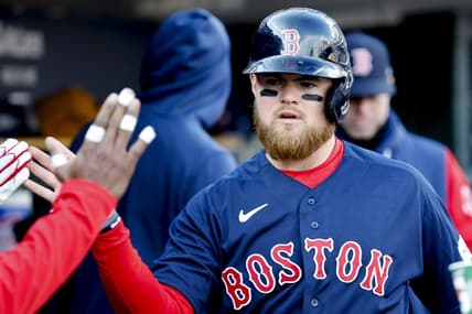 Apr 8, 2023; Detroit, Michigan, USA;  Boston Red Sox second baseman Christian Arroyo (39) receives congratulations from teammates after scoring in the eighth inning against the Detroit Tigers at Comerica Park. Mandatory Credit: Rick Osentoski-USA TODAY Sports