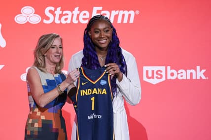Apr 10, 2023; New York, NY, USA; Aliyah Boston poses for a photo with WNBA Commissioner Cathy Engelbert after being drafted first overall by the Indiana Fever during WNBA Draft 2023 at Spring Studio. Mandatory Credit: Vincent Carchietta-USA TODAY Sports