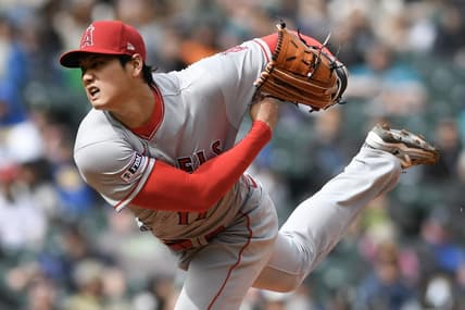 Apr 5, 2023; Seattle, Washington, USA; Los Angeles Angels starting pitcher Shohei Ohtani (17) throws a pitch against the Seattle Mariners during the fifth inning at T-Mobile Park. Mandatory Credit: Michael Thomas Shroyer-USA TODAY Sports