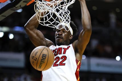 Apr 14, 2023; Miami, Florida, USA; Miami Heat forward Jimmy Butler (22) dunks the basketball during the first quarter against the Chicago Bulls at Kaseya Center. Mandatory Credit: Sam Navarro-USA TODAY Sports