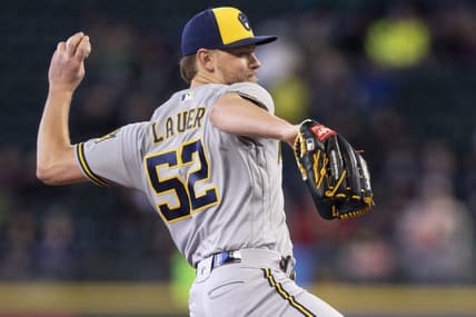 Apr 19, 2023; Seattle, Washington, USA; Milwaukee Brewers starter Eric Lauer (52) delivers a pitch during the fifth inning against the Seattle Mariners at T-Mobile Park. Mandatory Credit: Stephen Brashear-USA TODAY Sports