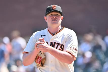 Apr 22, 2023; San Francisco, California, USA; San Francisco Giants starting pitcher Logan Webb (62) rubs up a baseball before the start of the fifth inning against the New York Mets at Oracle Park. Mandatory Credit: Robert Edwards-USA TODAY Sports