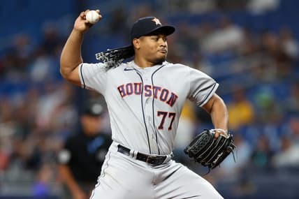 Apr 25, 2023; St. Petersburg, Florida, USA;  Houston Astros starting pitcher Luis Garcia (77) throws a pitch  against the Tampa Bay Rays in the first inning at Tropicana Field. Mandatory Credit: Nathan Ray Seebeck-USA TODAY Sports