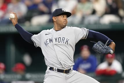 Apr 29, 2023; Arlington, Texas, USA; New York Yankees starting pitcher Jhony Brito (76) delivers against the Texas Rangers during the third inning at Globe Life Field. Mandatory Credit: Jim Cowsert-USA TODAY Sports
