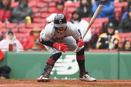 Apr 30, 2023; Boston, Massachusetts, USA; Cleveland Guardians second baseman Andres Gimenez (0) is hit by a pitch thrown by Boston Red Sox starting pitcher Chris Sale (41) during the fifth inning at Fenway Park. Mandatory Credit: Brian Fluharty-USA TODAY Sports