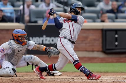 May 1, 2023; New York City, New York, USA; Atlanta Braves left fielder Eddie Rosario (8) follows through on a three run double against the New York Mets during the sixth inning at Citi Field. Mandatory Credit: Brad Penner-USA TODAY Sports