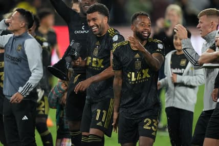 May 2, 2023; Los Angeles, CA, USA; LAFC midfielder Timothy Tillman (11) and midfielder Kellyn Acosta (23) celebrate after the game against the Philadelphia Union BMO Stadium. Mandatory Credit: Kirby Lee-USA TODAY Sports