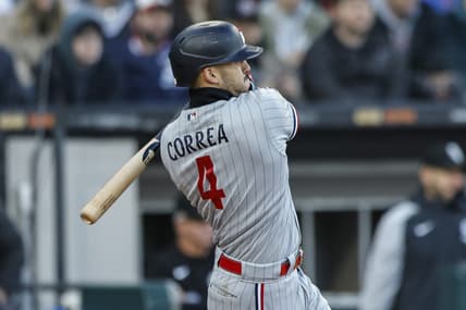May 3, 2023; Chicago, Illinois, USA; Minnesota Twins shortstop Carlos Correa (4) hits a two-run double against the Chicago White Sox during the third inning at Guaranteed Rate Field. Mandatory Credit: Kamil Krzaczynski-USA TODAY Sports