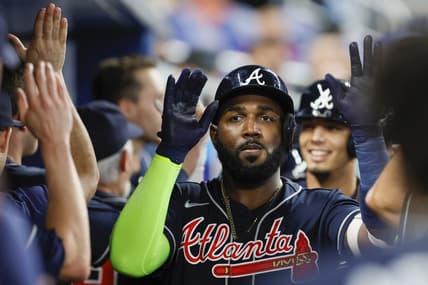 May 3, 2023; Miami, Florida, USA; Atlanta Braves designated hitter Marcell Ozuna (20) celebrates with teammates after hitting a grand slam during the second inning against the Miami Marlins at loanDepot Park. Mandatory Credit: Sam Navarro-USA TODAY Sports
