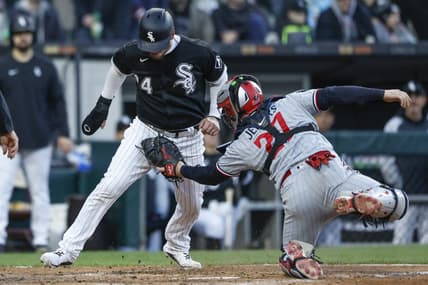 May 3, 2023; Chicago, Illinois, USA; Minnesota Twins catcher Ryan Jeffers (27) tags out Chicago White Sox catcher Yasmani Grandal (24) at home plate during the fourth inning at Guaranteed Rate Field. Mandatory Credit: Kamil Krzaczynski-USA TODAY Sports