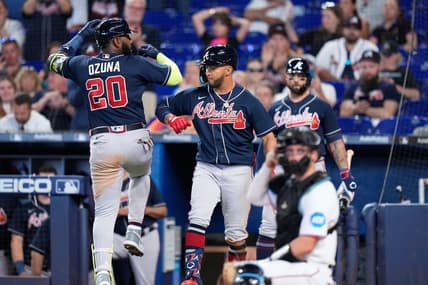 May 4, 2023; Miami, Florida, USA; Atlanta Braves designated hitter Marcell Ozuna (20) celebrates with teammates after hitting a home run against the Miami Marlins during the fourth inning at loanDepot Park. Mandatory Credit: Rich Storry-USA TODAY Sports