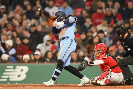 May 4, 2023; Boston, Massachusetts, USA; Toronto Blue Jays shortstop Bo Bichette (11) hits a two RBI single against the Boston Red Sox during the fifth inning at Fenway Park. Mandatory Credit: Brian Fluharty-USA TODAY Sports