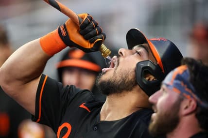 May 5, 2023; Atlanta, Georgia, USA; Baltimore Orioles right fielder Anthony Santander (25) drinks from the homer hose after a home run against the Atlanta Braves in the fourth inning at Truist Park. Mandatory Credit: Brett Davis-USA TODAY Sports