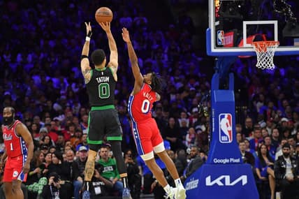May 5, 2023; Philadelphia, Pennsylvania, USA; Boston Celtics forward Jayson Tatum (0) shoots a three point basket over Philadelphia 76ers guard Tyrese Maxey (0) during the second quarter of game three of the 2023 NBA playoff at Wells Fargo Center. Mandatory Credit: Eric Hartline-USA TODAY Sports