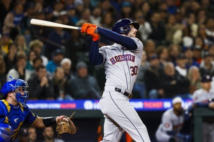 May 5, 2023; Seattle, Washington, USA; Houston Astros right fielder Kyle Tucker (30) hits a two-run home run against the Seattle Mariners during the ninth inning at T-Mobile Park. Mandatory Credit: Joe Nicholson-USA TODAY Sports