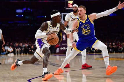 May 6, 2023; Los Angeles, California, USA; Los Angeles Lakers guard Dennis Schroder (17) moves the ball against Golden State Warriors guard Donte DiVincenzo (0) during the first half in game three of the 2023 NBA playoffs at Crypto.com Arena. Mandatory Credit: Gary A. Vasquez-USA TODAY Sports