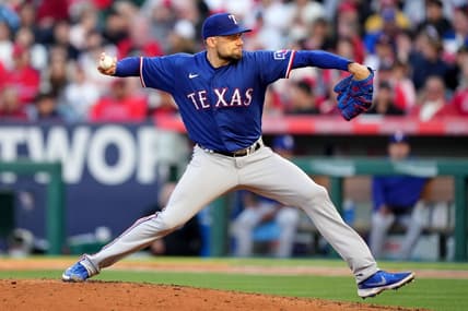 May 6, 2023; Anaheim, California, USA; Texas Rangers relief pitcher Dane Dunning (33) throws against the Los Angeles Angels in the third inning at Angel Stadium. Mandatory Credit: Kirby Lee-USA TODAY Sports