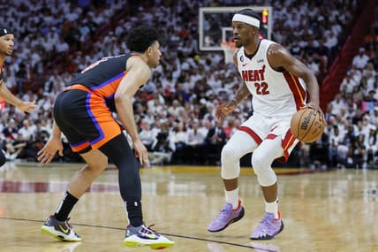 May 8, 2023; Miami, Florida, USA; Miami Heat forward Jimmy Butler (22) dribbles the basketball as New York Knicks guard Quentin Grimes (6) defends in the third quarter during game four of the 2023 NBA playoffs at Kaseya Center. Mandatory Credit: Sam Navarro-USA TODAY Sports