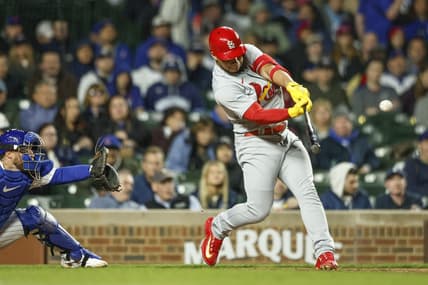 May 8, 2023; Chicago, Illinois, USA; St. Louis Cardinals catcher Willson Contreras (40) hits an RBI-double against the Chicago Cubs during sixth inning at Wrigley Field. Mandatory Credit: Kamil Krzaczynski-USA TODAY Sports