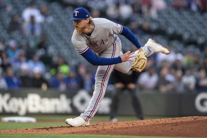 May 8, 2023; Seattle, Washington, USA; Texas Rangers starter Jon Gray (22) delivers a pitch during the second inning against the Seattle Mariners at T-Mobile Park. Mandatory Credit: Stephen Brashear-USA TODAY Sports