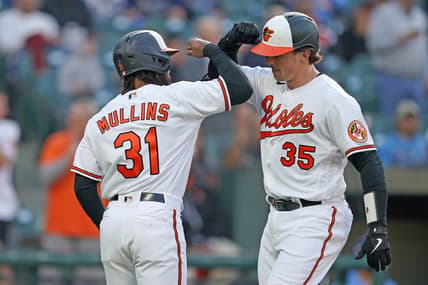 May 9, 2023; Baltimore, Maryland, USA; Baltimore Orioles catcher Adley Rutschman (35) greeted by outfielder Cedric Mullins (31) who scored on his two run home run in the third inning against the Tampa Bay Rays at Oriole Park at Camden Yards. Mandatory Credit: Mitch Stringer-USA TODAY Sports
