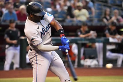May 9, 2023; Phoenix, Arizona, USA; Miami Marlins designated hitter Jorge Soler (12) hits a three run home run against the Arizona Diamondbacks during the first inning at Chase Field. Mandatory Credit: Joe Camporeale-USA TODAY Sports