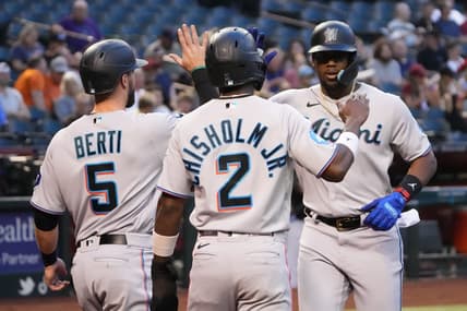 May 9, 2023; Phoenix, Arizona, USA; Miami Marlins designated hitter Jorge Soler (12) slaps hands with Miami Marlins shortstop Jon Berti (5) and Miami Marlins center fielder Jazz Chisholm Jr. (2) after hitting a three run home run against the Arizona Diamondbacks during the first inning at Chase Field. Mandatory Credit: Joe Camporeale-USA TODAY Sports