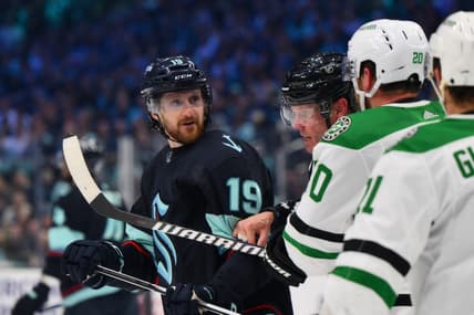 May 9, 2023; Seattle, Washington, USA; Seattle Kraken left wing Jared McCann (19) is separated from Dallas Stars defenseman Ryan Suter (20) during the second period in game four of the second round of the 2023 Stanley Cup Playoffs at Climate Pledge Arena. Mandatory Credit: Steven Bisig-USA TODAY Sports