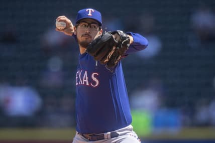 May 10, 2023; Seattle, Washington, USA; Texas Rangers starter Dane Dunning (33) delivers a pitch during the first inning against the Seattle Mariners at T-Mobile Park. Mandatory Credit: Stephen Brashear-USA TODAY Sports