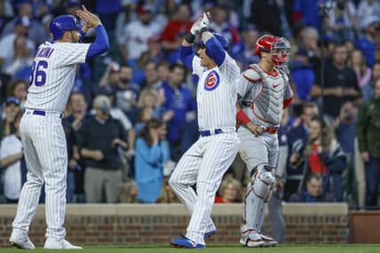 May 10, 2023; Chicago, Illinois, USA; Chicago Cubs catcher Yan Gomes (15) celebrates with first baseman Trey Mancini (36) after hitting a two-run home run against the St. Louis Cardinals during the fourth inning at Wrigley Field. Mandatory Credit: Kamil Krzaczynski-USA TODAY Sports