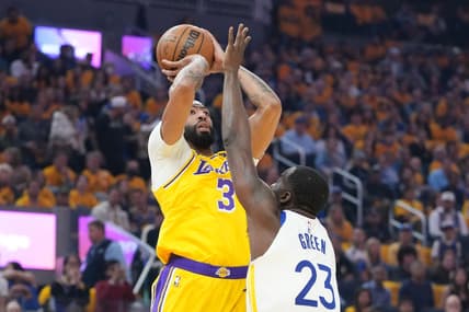 May 10, 2023; San Francisco, California, USA; Los Angeles Lakers forward Anthony Davis (3) shoots the basketball against Golden State Warriors forward Draymond Green (23) during the first quarter in game five of the 2023 NBA playoffs conference semifinals round at Chase Center. Mandatory Credit: Kyle Terada-USA TODAY Sports