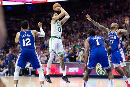 May 11, 2023; Philadelphia, Pennsylvania, USA; Boston Celtics forward Jayson Tatum (0) shoots the ball against Philadelphia 76ers forward Tobias Harris (12) and forward P.J. Tucker (17) during the fourth quarter in game six of the 2023 NBA playoffs at Wells Fargo Center. Mandatory Credit: Bill Streicher-USA TODAY Sports
