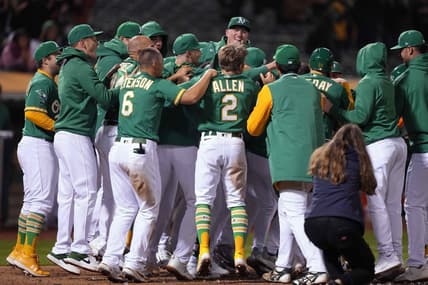 May 12, 2023; Oakland, California, USA; Oakland Athletics players celebrate at home plate after defeating the Texas Rangers at Oakland-Alameda County Coliseum. Mandatory Credit: Darren Yamashita-USA TODAY Sports