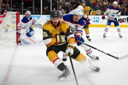 May 12, 2023; Las Vegas, Nevada, USA; Vegas Golden Knights right wing Reilly Smith (19) skates ahead of Edmonton Oilers center Ryan Nugent-Hopkins (93) during the third period of game five of the second round of the 2023 Stanley Cup Playoffs at T-Mobile Arena. Mandatory Credit: Stephen R. Sylvanie-USA TODAY Sports