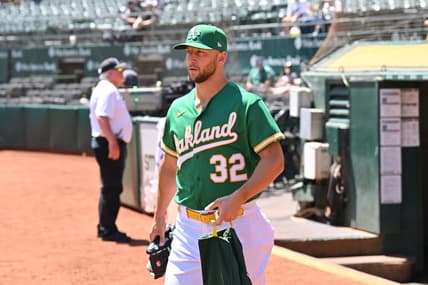 May 13, 2023; Oakland, California, USA; Oakland Athletics starting pitcher James Kaprielian (32) walks on the field before the game against the Texas Rangers at Oakland-Alameda County Coliseum. Mandatory Credit: Robert Edwards-USA TODAY Sports