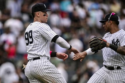 May 13, 2023; Bronx, New York, USA; New York Yankees center fielder Aaron Judge (99) celebrates with teammates after defeating the Tampa Bay Rays 9-8 at Yankee Stadium. Mandatory Credit: John Jones-USA TODAY Sports