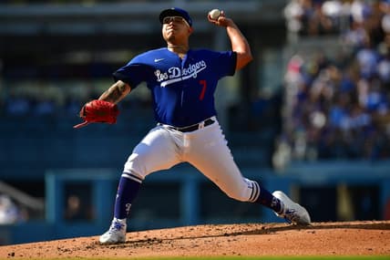 May 13, 2023; Los Angeles, California, USA; Los Angeles Dodgers starting pitcher Julio Urias (7) throws against the San Diego Padres during the second inning at Dodger Stadium. Mandatory Credit: Gary A. Vasquez-USA TODAY Sports
