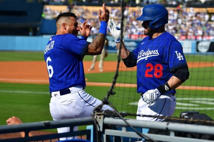 May 13, 2023; Los Angeles, California, USA; Los Angeles Dodgers designated hitter J.D. Martinez (28) is greeted by left fielder David Peralta (6) after hitting a three run home run against the San Diego Padres during the first inning at Dodger Stadium. Mandatory Credit: Gary A. Vasquez-USA TODAY Sports