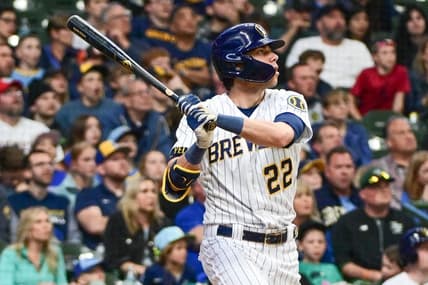 May 13, 2023; Milwaukee, Wisconsin, USA; Milwaukee Brewers left fielder Christian Yelich (22) hits a 2-run home run in the third inning against the Kansas City Royals at American Family Field. Mandatory Credit: Benny Sieu-USA TODAY Sports