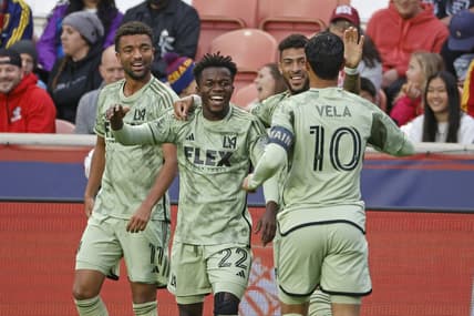 May 13, 2023; Sandy, Utah, USA; Los Angeles FC forward Kwadwo Opoku (22) is congratulated by forward Carlos Andres Gomez (11), forward Denis Bouanga (99) and forward Carlos Vela (10) after his first half goal against the Real Salt Lake at America First Field. Mandatory Credit: Jeff Swinger-USA TODAY Sports